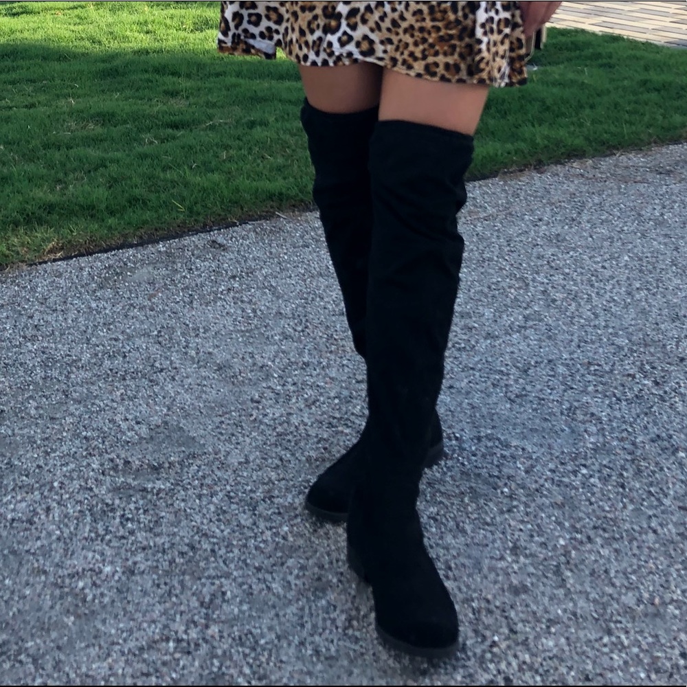 Over the knee black boots